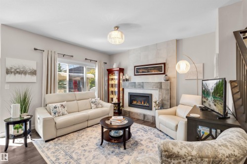 11 Rolston Close, Leduc, AB - Indoor Photo Showing Living Room With Fireplace
