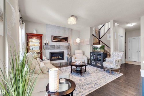 11 Rolston Close, Leduc, AB - Indoor Photo Showing Living Room With Fireplace