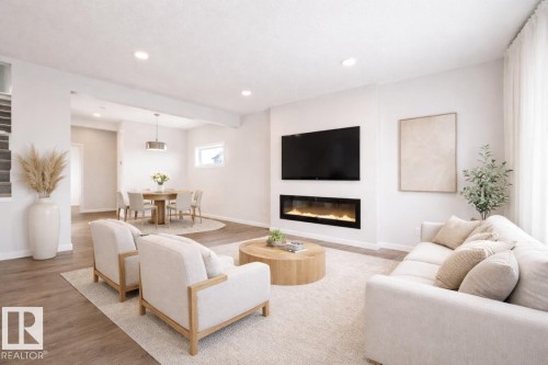 66 Gambel Loop, Spruce Grove, AB - Indoor Photo Showing Living Room With Fireplace