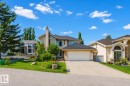 Two-story residence featuring a brick facade and a multi-car driveway leading to an attached garage - 342 O'Connor Close Nw, Edmonton, AB  - Outdoor With Facade 