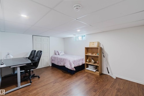 Room featuring wood-finish flooring, white walls, and recessed lighting - 342 O'Connor Close Nw, Edmonton, AB - Indoor