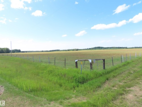 Expansive property featuring a vast field and distant tree line - 11216 Twp 532, Rural Yellowhead, AB 