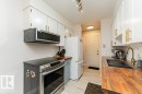 10B Callingwood Court Nw, Edmonton, AB  - Indoor Photo Showing Kitchen With Double Sink 
