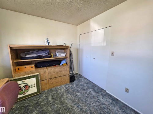 Room featuring white walls and a popcorn ceiling - 5201 54 Street, Elk Point, AB - Indoor Photo Showing Other Room