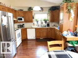 oak cupboards, lots of counter space, fridge (4.5 years) - 