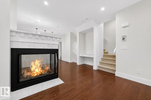 12620 106 Avenue Nw, Edmonton, AB - Indoor Photo Showing Living Room With Fireplace