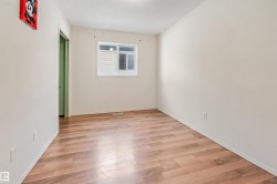 Hardwood-finish flooring complementing light-toned walls - 