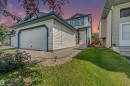 Two-story home with light-colored siding and contrasting trim - 16737 116 Street Nw, Edmonton, AB  - Outdoor 