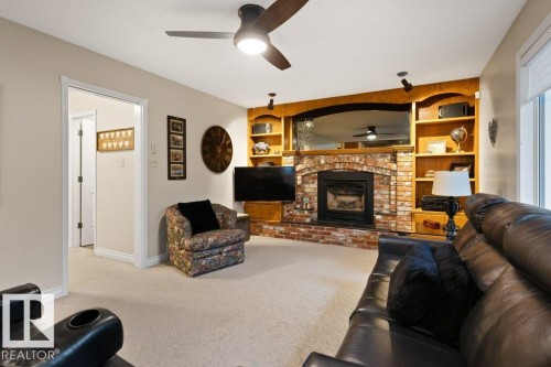 15 Lucien Drive, St. Albert, AB - Indoor Photo Showing Living Room With Fireplace