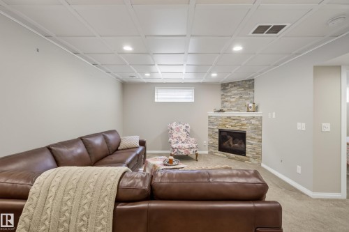 76 Leyland Way, Spruce Grove, AB - Indoor Photo Showing Other Room With Fireplace