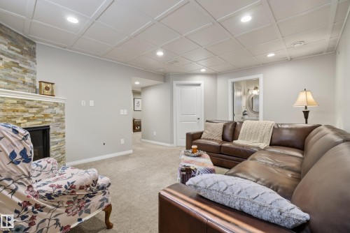 76 Leyland Way, Spruce Grove, AB - Indoor Photo Showing Living Room With Fireplace