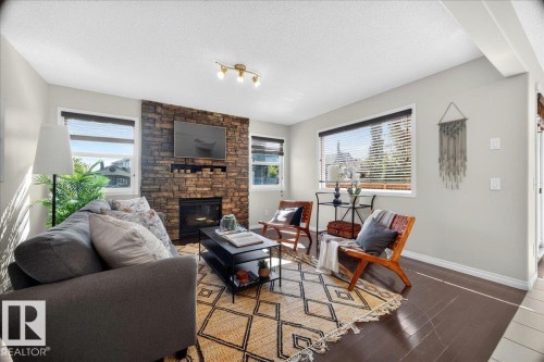 18069 89 Street Nw, Edmonton, AB - Indoor Photo Showing Living Room With Fireplace