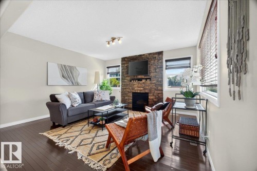 18069 89 Street Nw, Edmonton, AB - Indoor Photo Showing Living Room With Fireplace
