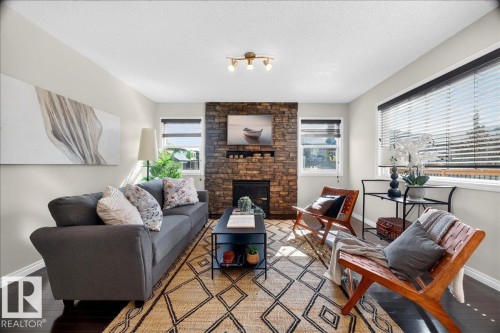 18069 89 Street Nw, Edmonton, AB - Indoor Photo Showing Living Room With Fireplace