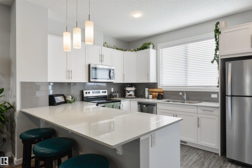 2617 Maple Way Nw, Edmonton, AB - Indoor Photo Showing Kitchen With Double Sink With Upgraded Kitchen