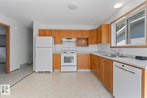 4813 45 Street, Cold Lake, AB - Indoor Photo Showing Kitchen With Double Sink