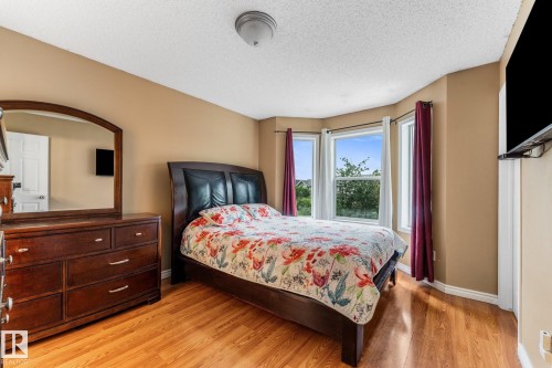 Great sized primary with bay window, walk-in in closet and 4 piece ensuite. - 13148 151 Avenue Nw, Edmonton, AB - Indoor Photo Showing Bedroom