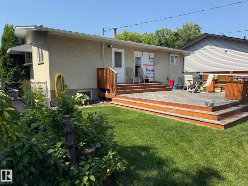 Expansive multi-level wood deck with integrated steps - 10837 155 Street Nw, Edmonton, AB - Outdoor With Deck Patio Veranda With Exterior