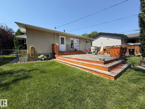 Spacious wood deck with multi-level design and direct access to the interior - 10837 155 Street Nw, Edmonton, AB - Outdoor With Deck Patio Veranda With Exterior