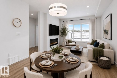 2903 64 Street Sw, Edmonton, AB - Indoor Photo Showing Dining Room With Fireplace
