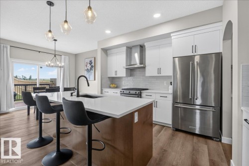 Kitchen - 347 Bluff Cove, Leduc, AB - Indoor Photo Showing Kitchen With Upgraded Kitchen