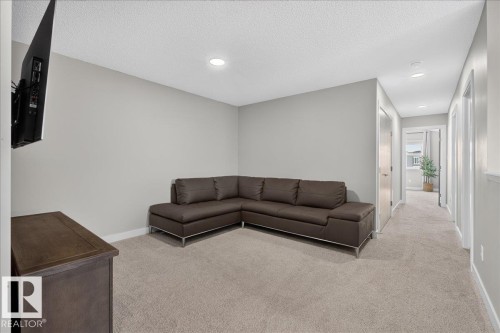 Living room - 347 Bluff Cove, Leduc, AB - Indoor Photo Showing Other Room