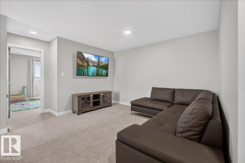Carpeted room with light gray walls, white trim, and recessed lighting - 347 Bluff Cove, Leduc, AB - Indoor