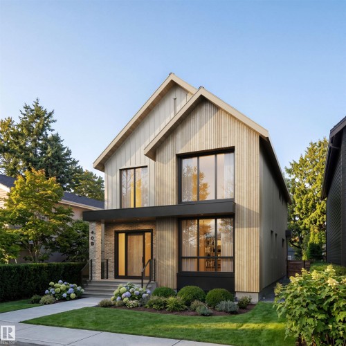 Contemporary two-story residence featuring a striking board and batten facade and a prominent gable roofline - 40B Valleyview Crescent Nw, Edmonton, AB - Outdoor