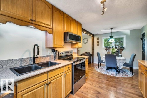 216 Greenwood Drive, Spruce Grove, AB - Indoor Photo Showing Kitchen With Double Sink