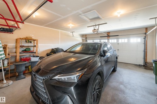 2338 Glenridding Boulevard Sw, Edmonton, AB - Indoor Photo Showing Garage