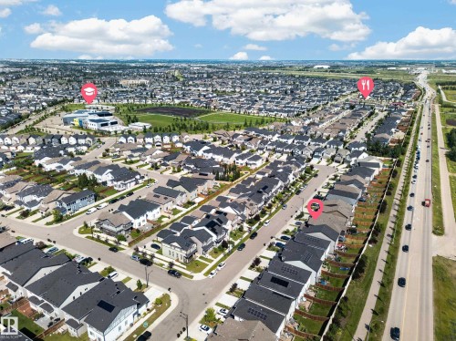 Aerial depiction of a residential neighborhood featuring rows of single-family homes with pitched roofs and established streets - 4620 Alwood Way Sw, Edmonton, AB - Outdoor With View
