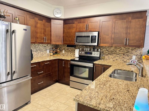 #304 100 Crystal Ln, Sherwood Park, AB - Indoor Photo Showing Kitchen With Double Sink With Upgraded Kitchen