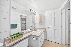 Full-length vanity mirror with a four-bulb light fixture - 