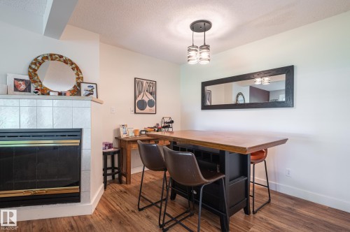11515 125 Street Nw, Edmonton, AB - Indoor Photo Showing Dining Room With Fireplace