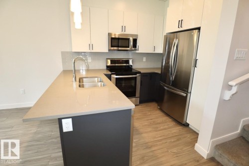 8603 108A Street Northwest, Edmonton, AB - Indoor Photo Showing Kitchen With Stainless Steel Kitchen With Double Sink