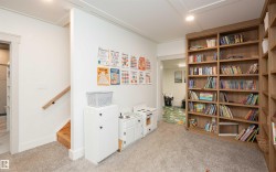 Built-in wood-finish shelving unit provides ample storage - 