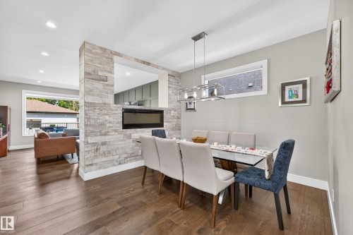 7544 78 Avenue Nw, Edmonton, AB - Indoor Photo Showing Dining Room With Fireplace