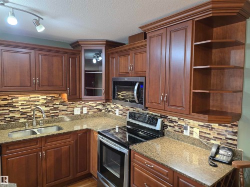 #337 2096 Blackmud Creek Dr Sw, Edmonton, AB - Indoor Photo Showing Kitchen With Double Sink