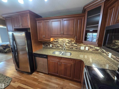 #337 2096 Blackmud Creek Dr Sw, Edmonton, AB - Indoor Photo Showing Kitchen With Double Sink