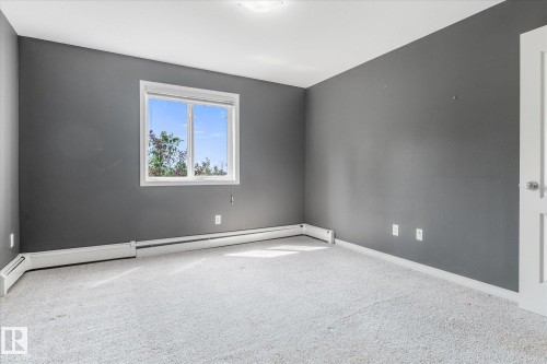 #208 4903 47 Av, Stony Plain, AB - Indoor Photo Showing Other Room