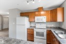 #208 4903 47 Av, Stony Plain, AB  - Indoor Photo Showing Kitchen With Double Sink 