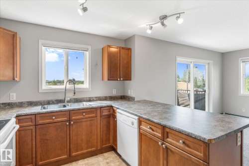 #208 4903 47 Av, Stony Plain, AB - Indoor Photo Showing Kitchen With Double Sink