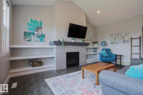 9711 223 Street Nw, Edmonton, AB - Indoor Photo Showing Living Room With Fireplace