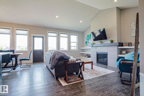 9711 223 Street Nw, Edmonton, AB - Indoor Photo Showing Living Room With Fireplace