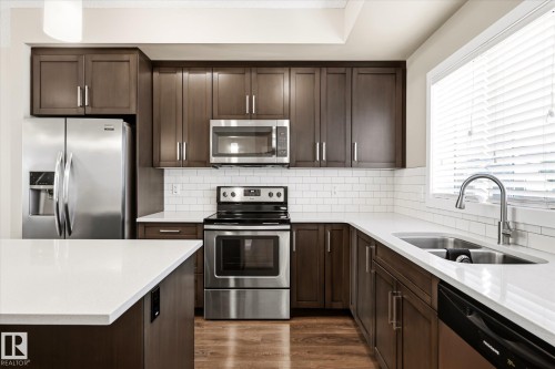 2016 Cavanagh Drive Sw, Edmonton, AB - Indoor Photo Showing Kitchen With Stainless Steel Kitchen With Double Sink With Upgraded Kitchen