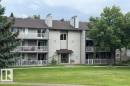 Three-story multi-unit building featuring individual balconies and ground-level patios - #307 6212 180 St Nw, Edmonton, AB  - Outdoor 