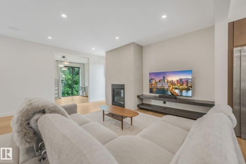 10925 University Avenue Nw, Edmonton, AB - Indoor Photo Showing Living Room With Fireplace