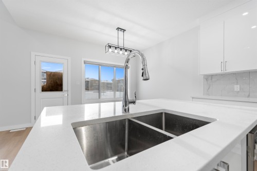 47 Axelwood Crescent, Spruce Grove, AB - Indoor Photo Showing Kitchen With Double Sink