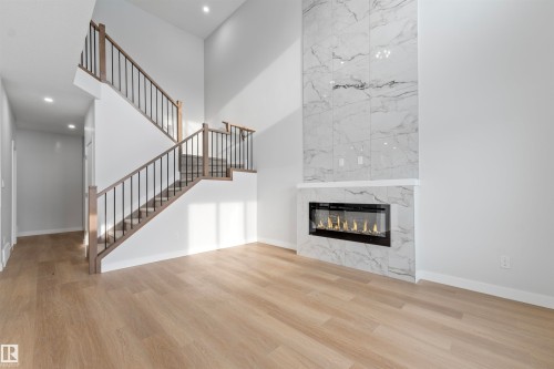 47 Axelwood Crescent, Spruce Grove, AB - Indoor Photo Showing Living Room With Fireplace
