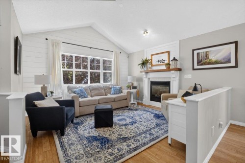 1012 79 Street Sw, Edmonton, AB - Indoor Photo Showing Living Room With Fireplace